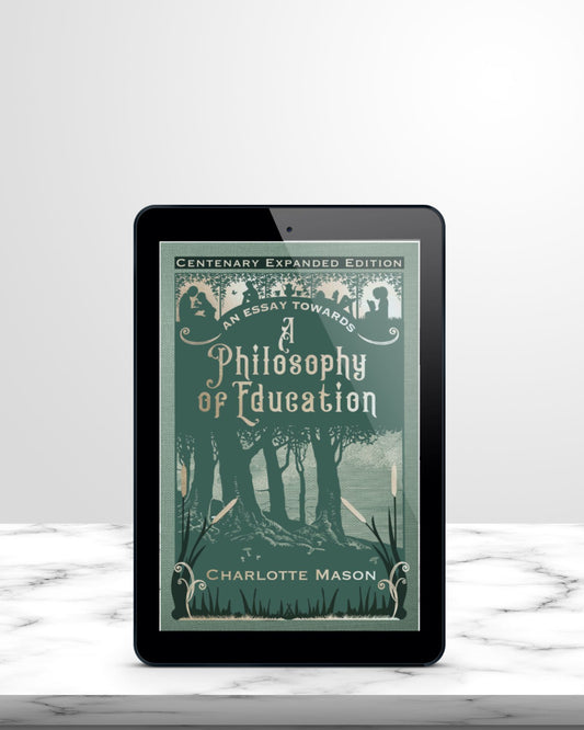 A tablet standing on white marble displaying the cover of the ebook An Essay Towards A Philosophy of Education"