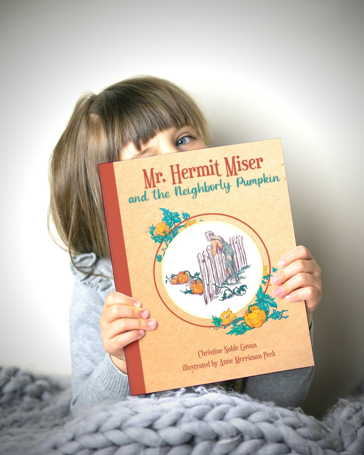 Hardcover of "Mr. Hermit Miser and the Neighborly Pumpkin," a wholesome autumn classic by Noble Govan, published by Smidgen Press