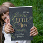 A happy young girl holding a beautiful hardcover edition of Little Men by Louisa May Alcott, published by Smidgen Press. Illustrations by Clara M. Burd.