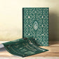 The hardback "An Essay Towards a Philosophy of Education" stands displaying its decorative inner cover with the beautiful green dust jacket lying on the blond table next to it.